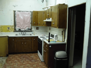 The awkward doorway leading to a bathroom off the kitchen.