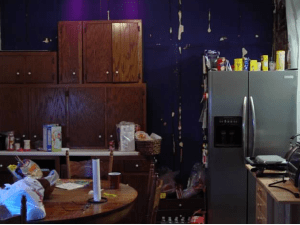 When we removed the old panelling off the wall in the eat in area, we found a dark blue wall color.